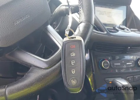 2017 Ford Escape Titanium z USA, uszkodzony, nr VIN 1FMCU0JD0HUD09406